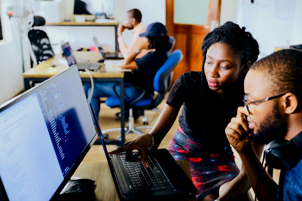 Two founders reading a report together